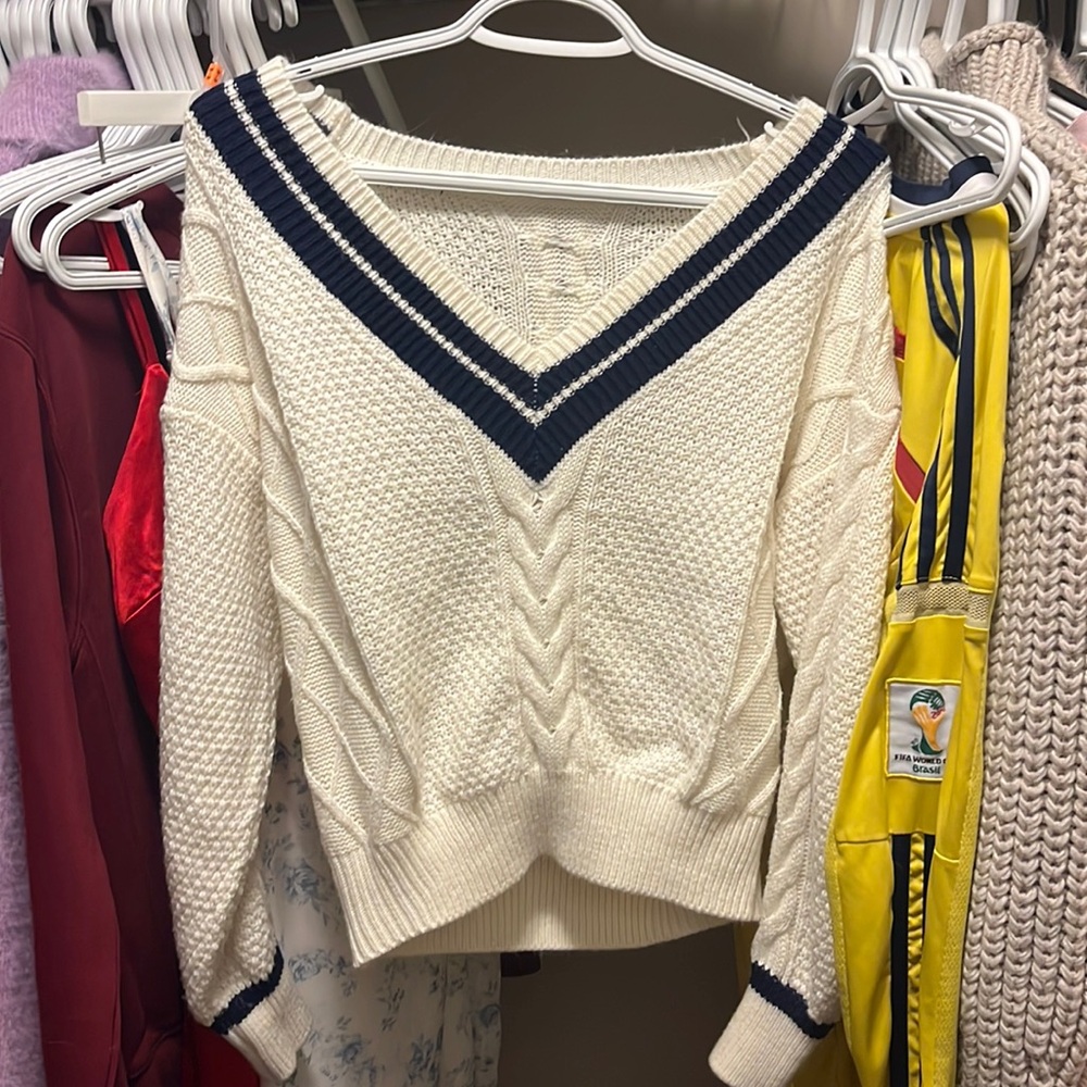 Knit sweater.
